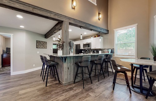 Mason County House | Inviting riverfront home with hot tub, firepit, W/D, & dog-friendly