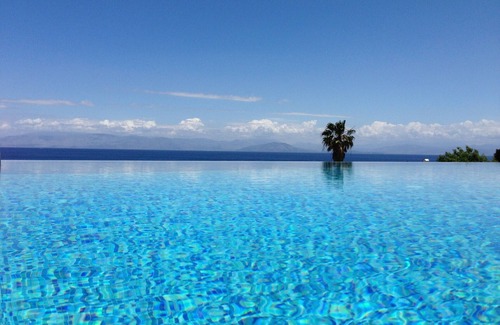 Notos Villa | Ionian Pearl villa in Corfu. Private pool - Jacuzzi - Sauna - Cinema, 4 bedrooms