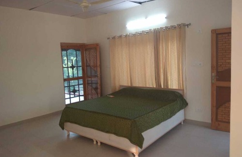 Gopalpur Other | It is surrounded by lush green mountains, with fruit garden & vegetable fields.