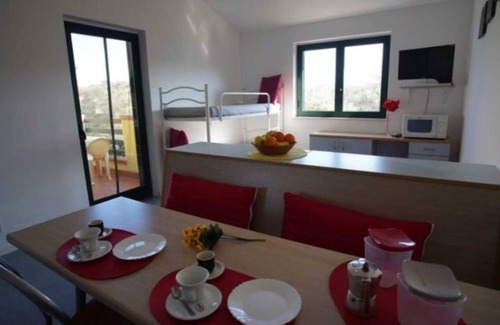 Sant'Andrea Apostolo dello Ionio Apartment | Apartment 'Tra Ulivi E Mare' with Shared Garden, Wi-Fi and Air Conditioning