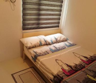 Santo Cristo House | Ivy's Crib at Grass Residences