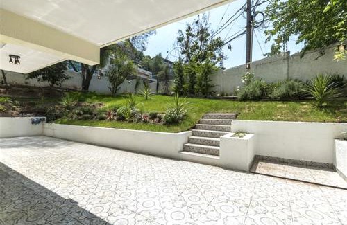 El Golf Apartment | Jardín privado para familias y trabajo