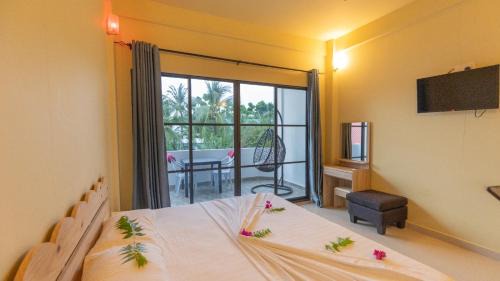 Thoddoo House | Jenyva Inn