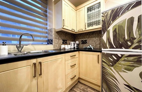 Rhondda Cynon Taff Apartment | Joyful Jungle Jewel w/Balcony & Foozeball-Ferndale