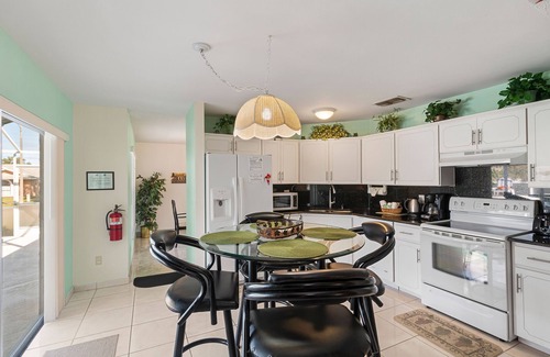 Indian Ridge House | Just 3 mi. to Disney, pool (fully fenced in for privacy), 4 TVs, games room