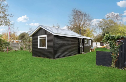 Store Fuglede House | Just a short walk from the sandy beach, this practical vacation home welcomes you.