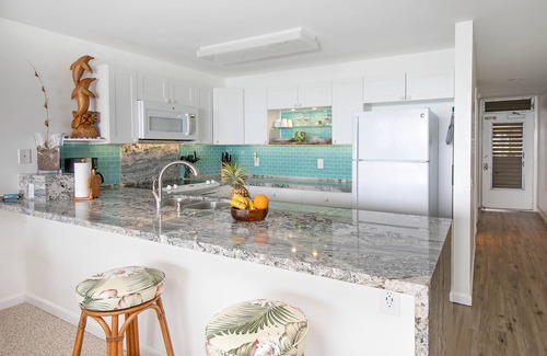 Wailua House Lots Condo | Just renovated and right on the ocean! No hidden fees.