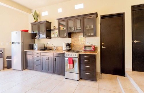 Cerritos Condo | Just steps from the Beach; Panoramic ocean views from private rooftop balcony!