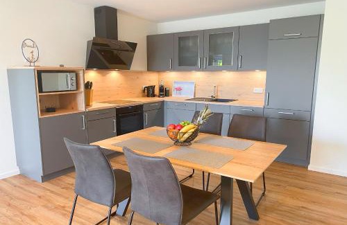 Tossens Apartment | KÜSTE33/20 – Exklusive Ferienwohnung mit Sauna & nah am Strand!