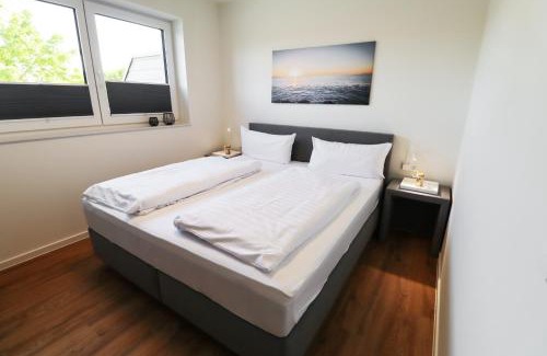 Tossens Apartment | KÜSTE33/20 – Exklusive Ferienwohnung mit Sauna & nah am Strand!