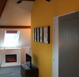 Lutten Apartment | Karin's kruidenhoeve B&B kamer Kamille met Finse sauna