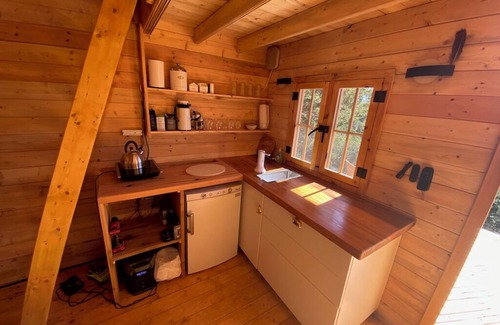 Frontenac Cabin | Kiltearn on the Peak: Cozy off-grid tiny house with an amazing lake view