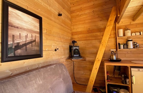 Frontenac Cabin | Kiltearn on the Peak: Cozy off-grid tiny house with an amazing lake view