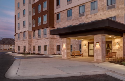 Overland Park Condo | King Suite. Free Breakfast. Pool. Shared BBQ.