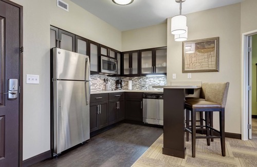 Maryland Heights Condo | King Suite Near Edward Jones! Shared BBQ Area + Shared Pool On-Site