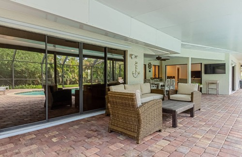 Kings Lake House | Kings Lake: 3 BR home w/3 en suite baths, heated pool & expansive covered lanai w/outdoor TV
