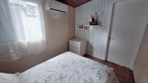 Torres Apartment | KITNET k1 em TORRES-RS - Na mais bela praia Gaúcha - 2 quartos - Frigobar - micro-ondas - banheiro - ar condicionado split - TV smart 32' - Wi-Fi - Anfitriã Superhost no BnB