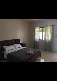 Guindulman Hotel | KJT Travellers Inn
