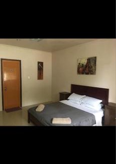 Guindulman Hotel | KJT Travellers Inn