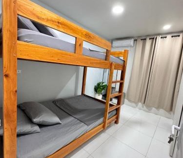 San Juan Apartment | KM Suites 2BR Unit Near San Juan LU