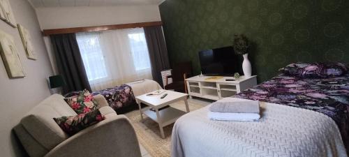 Rauma House | Kortteer vihreä huone