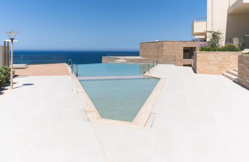 Kalyves Apartment | Kymvari - Stunning sea view-elegant apt-infinity shared pool