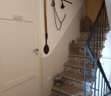 Lucca House | L'Acero Rosso
