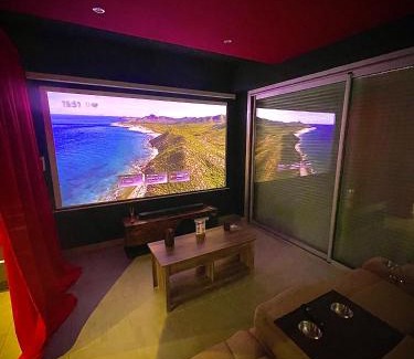 Quartier des Eaux-Claires Apartment | L unique Cinéma Room