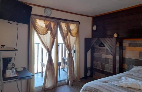 Corozal Hotel | La Delphina Bed and Breakfast Bar and Grill King Suite with Sea View
