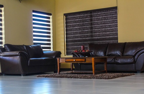 Cuauhtemoc Hotel | La Huerta Inn & Suites