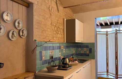 Albinea Apartment | La Maison Deux, an old farmhouse from the late 18th century, with Provençal features.