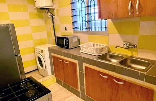 Angre Apartment | La Siesta Abidjan-Charming 2-bedroom Split-Mezzanine level apartment; WiFi-AC.