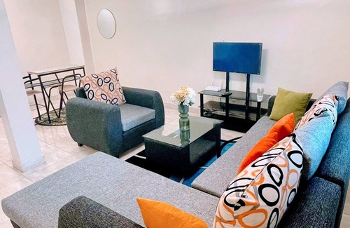 Angre Apartment | La Siesta Abidjan-Charming 2-bedroom Split-Mezzanine level apartment; WiFi-AC.