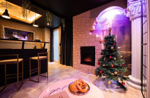 Schirrhein Apartment | La Suite de Vénus - Chambre à thème Love Room Jacuzzi et Pièce Secrète - Évasion pour deux