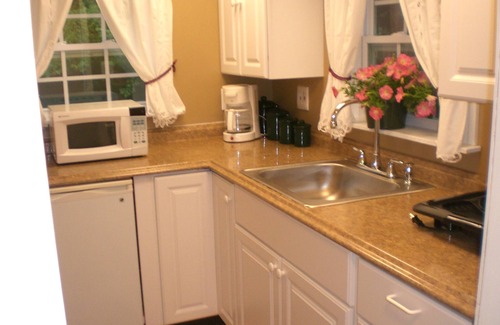 Northwood Apartment | Lake Cottage Studio, Sandy Beach, RowBoat & Kayaks, Awesome Fishing, Swimming