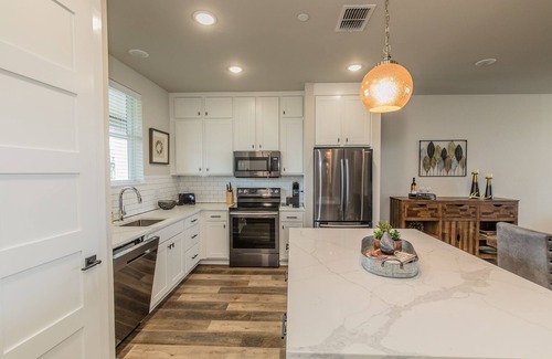 Graford Condo | Lake front Condo 2BD/2BA w/pool, hot tub, fire pit, gas grills, gym, & laundry.