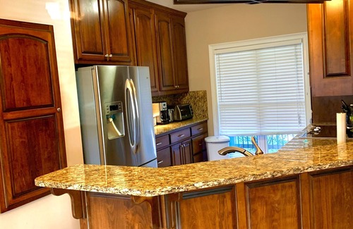Gumlog House | Lake Front Home. 3 Large Living Spaces. Screened Porches. Pet Friendly.