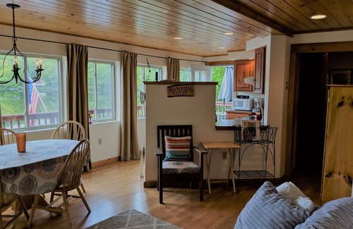 Woodsville House | LAKE HOUSE on the water w/2 kayaks, canoe, huge deck, swim raft, dock, fire pit