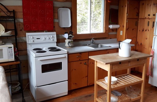 Manitoulin District House | Lake Huron Log Home Municipal License# 2022STA-002