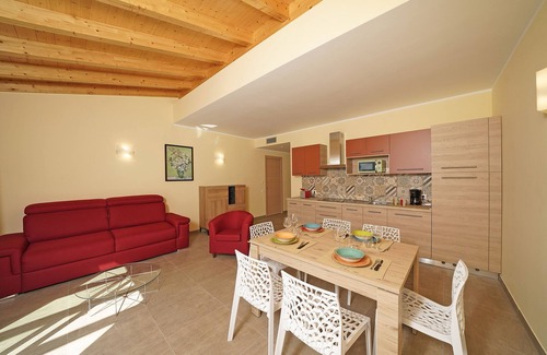 Gargnano Condo | lake view apartment quiet location parking and swimming pool in the olive trees.