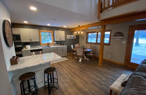 Treasure Lake House | Lakefront 4 Bedroom 2.5 Bath Hot Tub, Firepit, Dock, Deck and great backya