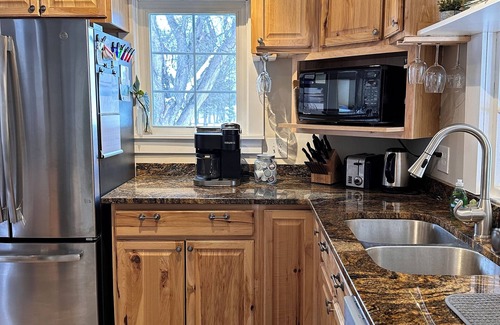 Moose Lake House | Lakefront Beach Bungalow - Retreat & Relax - Kayaks, Fire pit, Tree Swings!