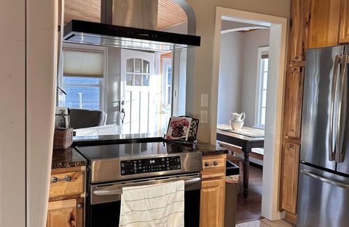 Moose Lake House | Lakefront Beach Bungalow - Retreat & Relax - Kayaks, Fire pit, Tree Swings!