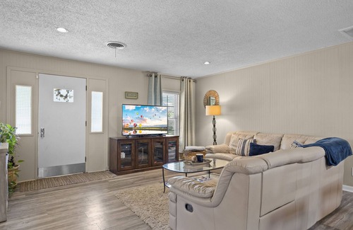 Silver Creek Village House | Lakefront Cottage with Private Dock, Wood-Burning Fireplace and Sunroom