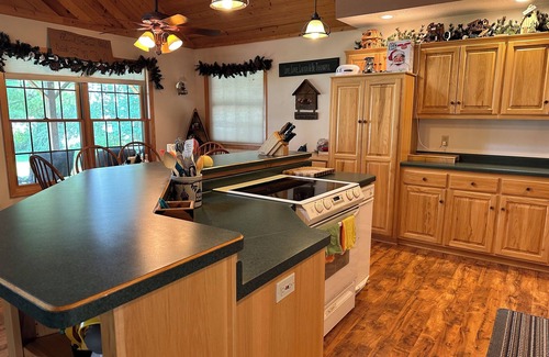 Burtrum House | Lakefront home ice fishing snowmobile trail access with beautiful sunrise view