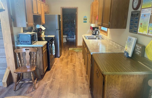 Wild Rose House | Lakefront home-large beach & yard, clean water-RELAX & build memories- sleeps 12