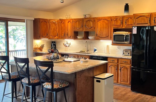 Freedom House | Lakefront home on Leavitt Bay, with private beach, dock, and an amazing view