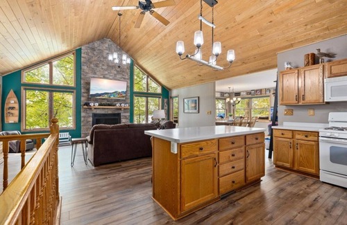 Nevis Cabin | Lakefront retreat on Island Lake. Two cabins, 7 bedrooms, sand beach, privacy+