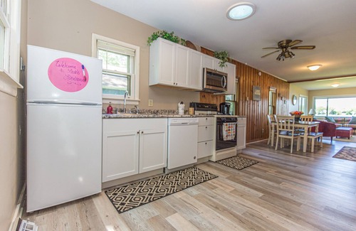 Valparaiso House | Lakehouse with Pontoon, Deck, Firepit, Paddle Boards, Grill & more INCLUDED!