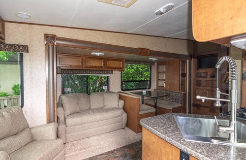 Heath Condo | Lakeside Getaway: Pool, Sauna, 2BR Over Garage Condo and RV, Fishing, Playground, Basketball Court!